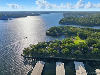 This truly spectacular Walk-in level Waterfront condo. Has on Seasons Ridge At Four Seasons in Missouri - for sale on GolfHomes.com, golf home, golf lot