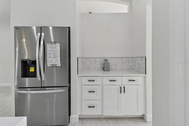 Welcome to 13792 Long Lake, a fully remodeled luxury residence on Riverwood Golf Club in Florida - for sale on GolfHomes.com, golf home, golf lot