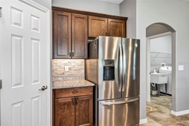 IMMACULATELY MAINTAINED 3 BEDROOM, 2 BATH LOW-MAINTENANCE STUCCO on Arlington Ridge Golf Club in Florida - for sale on GolfHomes.com, golf home, golf lot