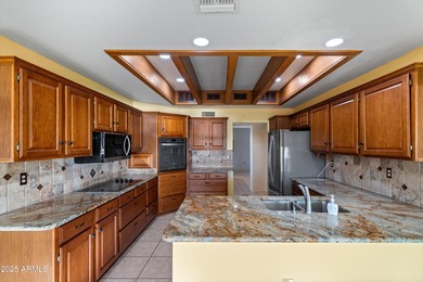 Set on a premium golf course lot with sweeping mountain views on Deer Valley Golf Course in Arizona - for sale on GolfHomes.com, golf home, golf lot