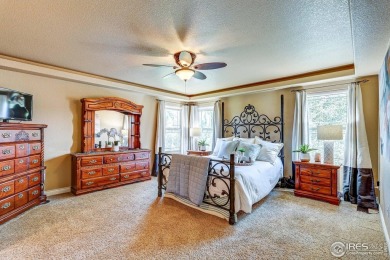 Beautiful custom built 5-bedroom, 4-bath two-story home tucked on Pelican Lakes Golf and Country Club in Colorado - for sale on GolfHomes.com, golf home, golf lot