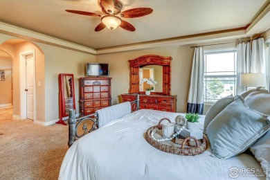 Beautiful custom built 5-bedroom, 4-bath two-story home tucked on Pelican Lakes Golf and Country Club in Colorado - for sale on GolfHomes.com, golf home, golf lot
