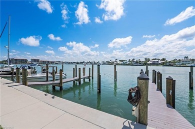 Experience elevated coastal living in the heart of Naples with on The Moorings Country Club in Florida - for sale on GolfHomes.com, golf home, golf lot