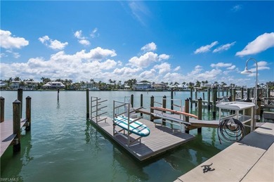 ATTENTION BOATERS PARADISE..this unit comes with a BOAT DOCK on The Moorings Country Club in Florida - for sale on GolfHomes.com, golf home, golf lot