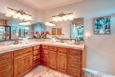 Beautiful custom built 5-bedroom, 4-bath two-story home tucked on Pelican Lakes Golf and Country Club in Colorado - for sale on GolfHomes.com, golf home, golf lot