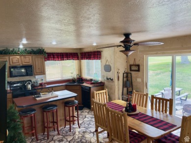 Fairway Golf Lodge nestled on the 3rd hole of the Bear Lake Golf on Bear Lake Golf Course in Utah - for sale on GolfHomes.com, golf home, golf lot