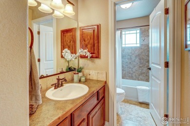 Beautiful custom built 5-bedroom, 4-bath two-story home tucked on Pelican Lakes Golf and Country Club in Colorado - for sale on GolfHomes.com, golf home, golf lot