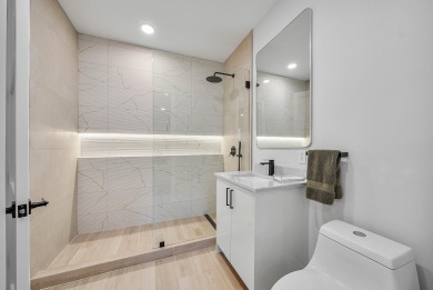 This stunning Restoration Hardware decorated home is located in on Broken Sound Golf and Club  in Florida - for sale on GolfHomes.com, golf home, golf lot