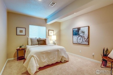 Beautiful custom built 5-bedroom, 4-bath two-story home tucked on Pelican Lakes Golf and Country Club in Colorado - for sale on GolfHomes.com, golf home, golf lot