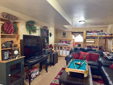 Fairway Golf Lodge nestled on the 3rd hole of the Bear Lake Golf on Bear Lake Golf Course in Utah - for sale on GolfHomes.com, golf home, golf lot