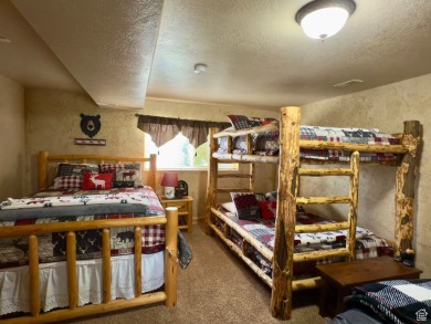 Fairway Golf Lodge nestled on the 3rd hole of the Bear Lake Golf on Bear Lake Golf Course in Utah - for sale on GolfHomes.com, golf home, golf lot