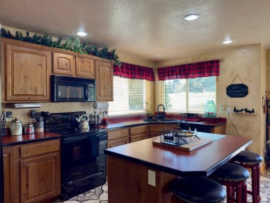 Fairway Golf Lodge nestled on the 3rd hole of the Bear Lake Golf on Bear Lake Golf Course in Utah - for sale on GolfHomes.com, golf home, golf lot
