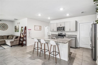 Welcome to this beautifully maintained 5-bedroom, 3-bathroom on Venetian Bay Golf Course in Florida - for sale on GolfHomes.com, golf home, golf lot