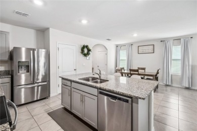 Welcome to this beautifully maintained 5-bedroom, 3-bathroom on Venetian Bay Golf Course in Florida - for sale on GolfHomes.com, golf home, golf lot
