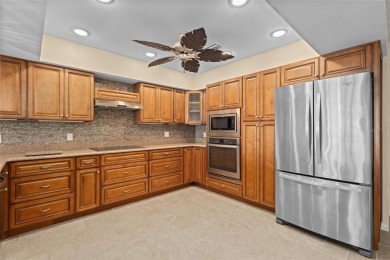 Enjoy waterfront living at its finest in this spacious on Burnt Store Golf Club in Florida - for sale on GolfHomes.com, golf home, golf lot