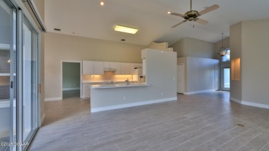 This lovely 3BR 2 BA home is located in the highly desirable on Plantation Bay Golf and Country Club in Florida - for sale on GolfHomes.com, golf home, golf lot