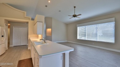 This lovely 3BR 2 BA home is located in the highly desirable on Plantation Bay Golf and Country Club in Florida - for sale on GolfHomes.com, golf home, golf lot