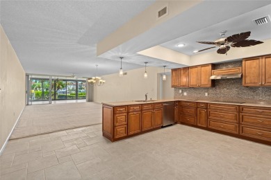 Enjoy waterfront living at its finest in this spacious on Burnt Store Golf Club in Florida - for sale on GolfHomes.com, golf home, golf lot