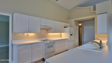 This lovely 3BR 2 BA home is located in the highly desirable on Plantation Bay Golf and Country Club in Florida - for sale on GolfHomes.com, golf home, golf lot