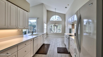 This lovely 3BR 2 BA home is located in the highly desirable on Plantation Bay Golf and Country Club in Florida - for sale on GolfHomes.com, golf home, golf lot