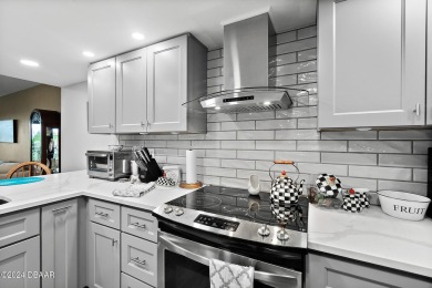 EXPERIENCE COASTAL LIVING AT ITS FINEST IN THIS STUNNING CONDO! on Oceans Golf Club in Florida - for sale on GolfHomes.com, golf home, golf lot