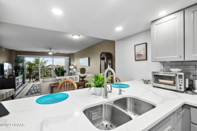 EXPERIENCE COASTAL LIVING AT ITS FINEST IN THIS STUNNING CONDO! on Oceans Golf Club in Florida - for sale on GolfHomes.com, golf home, golf lot