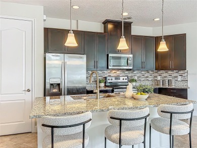 Under contract-accepting backup offers. Beautiful END-UNIT on Eagle Creek Golf Club in Florida - for sale on GolfHomes.com, golf home, golf lot