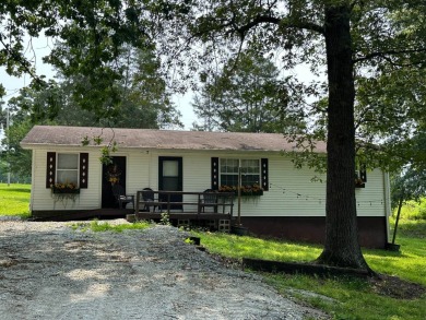 This home is a 3 bedroom, 2 bath home located only minutes from on Tennessean Golf Club in Tennessee - for sale on GolfHomes.com, golf home, golf lot