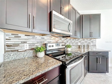 Under contract-accepting backup offers. Beautiful END-UNIT on Eagle Creek Golf Club in Florida - for sale on GolfHomes.com, golf home, golf lot