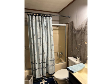 This home is a 3 bedroom, 2 bath home located only minutes from on Tennessean Golf Club in Tennessee - for sale on GolfHomes.com, golf home, golf lot