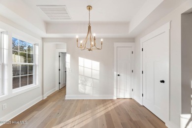 This custom home is like no other, where every detail is on Brick Landing Plantation Yacht and Golf Club in North Carolina - for sale on GolfHomes.com, golf home, golf lot