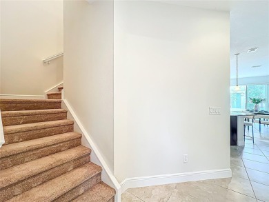Under contract-accepting backup offers. Beautiful END-UNIT on Eagle Creek Golf Club in Florida - for sale on GolfHomes.com, golf home, golf lot