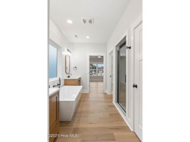 This custom home is like no other, where every detail is on Brick Landing Plantation Yacht and Golf Club in North Carolina - for sale on GolfHomes.com, golf home, golf lot