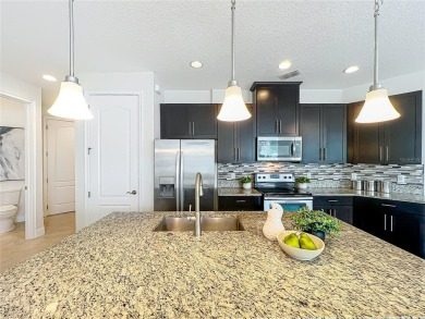Under contract-accepting backup offers. Beautiful END-UNIT on Eagle Creek Golf Club in Florida - for sale on GolfHomes.com, golf home, golf lot