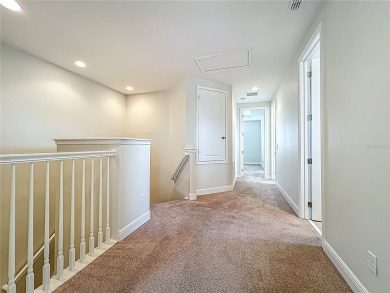 Under contract-accepting backup offers. Beautiful END-UNIT on Eagle Creek Golf Club in Florida - for sale on GolfHomes.com, golf home, golf lot