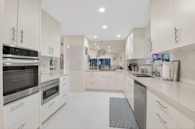 Welcome to this beautifully maintained and thoughtfully on Boca West Golf and Country Club in Florida - for sale on GolfHomes.com, golf home, golf lot