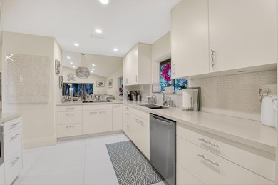 Welcome to this beautifully maintained and thoughtfully on Boca West Golf and Country Club in Florida - for sale on GolfHomes.com, golf home, golf lot