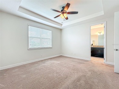 Under contract-accepting backup offers. Beautiful END-UNIT on Eagle Creek Golf Club in Florida - for sale on GolfHomes.com, golf home, golf lot