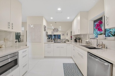 Welcome to this beautifully maintained and thoughtfully on Boca West Golf and Country Club in Florida - for sale on GolfHomes.com, golf home, golf lot