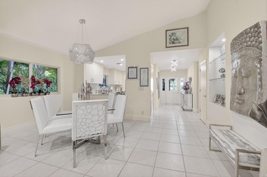 Welcome to this beautifully maintained and thoughtfully on Boca West Golf and Country Club in Florida - for sale on GolfHomes.com, golf home, golf lot