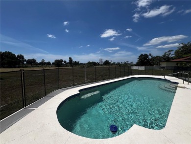 This Adorable Pool Home is located at the end of a cul-de-sac on on Port Charlotte Golf Club in Florida - for sale on GolfHomes.com, golf home, golf lot
