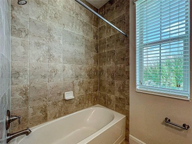 Under contract-accepting backup offers. Beautiful END-UNIT on Eagle Creek Golf Club in Florida - for sale on GolfHomes.com, golf home, golf lot