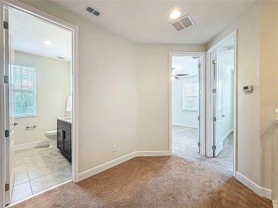 Under contract-accepting backup offers. Beautiful END-UNIT on Eagle Creek Golf Club in Florida - for sale on GolfHomes.com, golf home, golf lot
