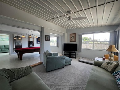 This Adorable Pool Home is located at the end of a cul-de-sac on on Port Charlotte Golf Club in Florida - for sale on GolfHomes.com, golf home, golf lot