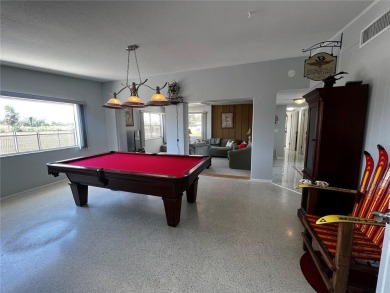 This Adorable Pool Home is located at the end of a cul-de-sac on on Port Charlotte Golf Club in Florida - for sale on GolfHomes.com, golf home, golf lot