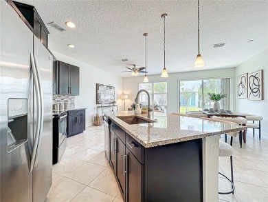 Under contract-accepting backup offers. Beautiful END-UNIT on Eagle Creek Golf Club in Florida - for sale on GolfHomes.com, golf home, golf lot