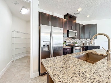 Under contract-accepting backup offers. Beautiful END-UNIT on Eagle Creek Golf Club in Florida - for sale on GolfHomes.com, golf home, golf lot