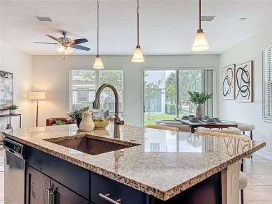 Under contract-accepting backup offers. Beautiful END-UNIT on Eagle Creek Golf Club in Florida - for sale on GolfHomes.com, golf home, golf lot
