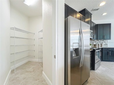 Under contract-accepting backup offers. Beautiful END-UNIT on Eagle Creek Golf Club in Florida - for sale on GolfHomes.com, golf home, golf lot