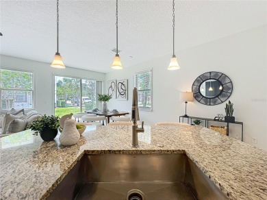 Under contract-accepting backup offers. Beautiful END-UNIT on Eagle Creek Golf Club in Florida - for sale on GolfHomes.com, golf home, golf lot